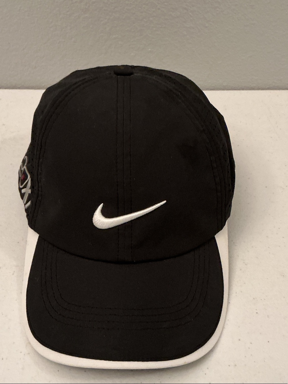 Nike Black Hat with White Swoosh and Trim